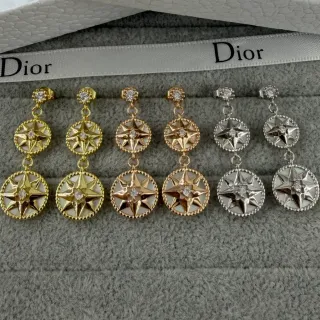 Dior Boucles d'oreilles or argent double-niveaux motif boussole étoile perle mère incrustée