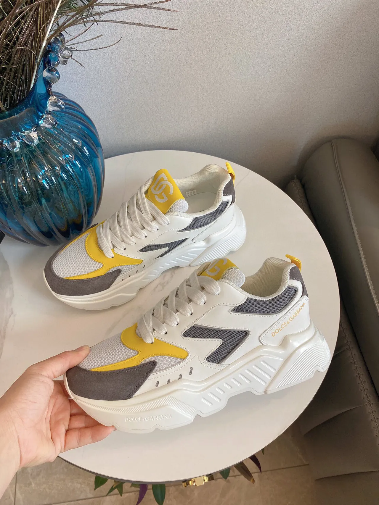 Dolce & Gabbana Portofino sneakers chunky semelle blanche jaune blocage couleur asymétrique 1