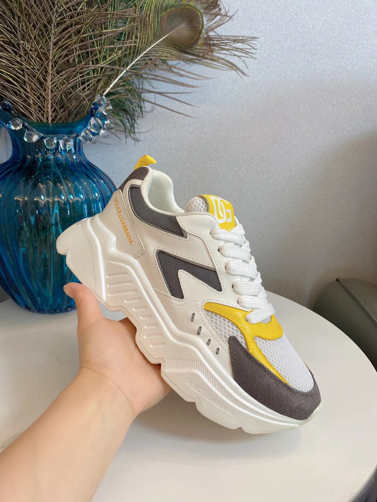 Dolce & Gabbana Portofino sneakers chunky semelle blanche jaune blocage couleur asymétrique 7