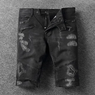 شورت أسود وأبيض distressed مع سحاب وجيوب