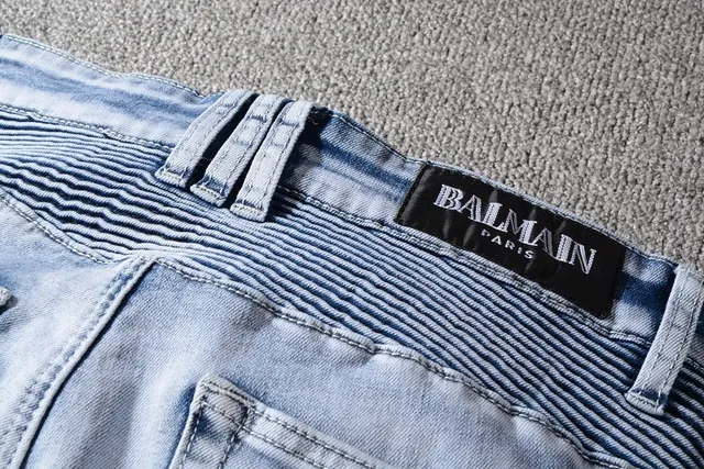 Jeans bleu et blanc distressed à poches zippées 3