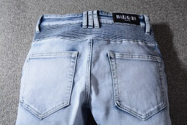 Jeans bleu et blanc distressed à poches zippées 5