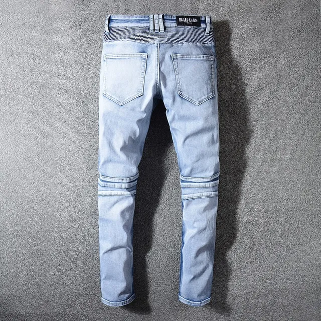Jeans bleu et blanc distressed à poches zippées 6