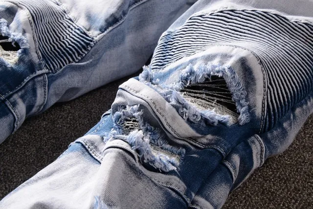 Jeans bleu et blanc distressed à poches zippées 9