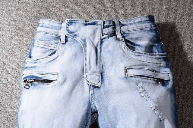 Jeans bleu et blanc distressed à poches zippées 10