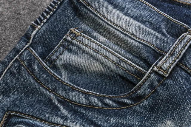 بناطيل الجينز الزرقاء مع لوحات موتور الممزقة 13