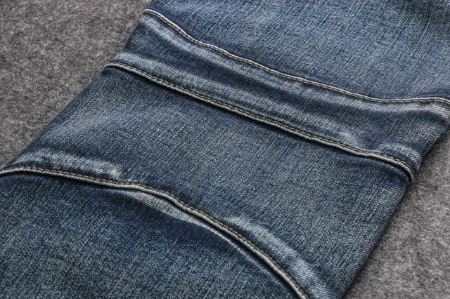 بناطيل الجينز الزرقاء مع لوحات موتور الممزقة 18