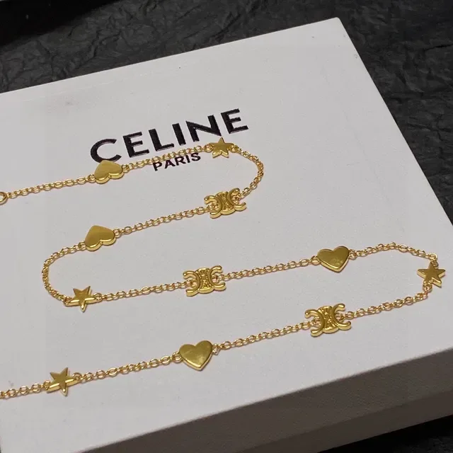 Collier chaîne avec charms de cœur et étoile en or 3