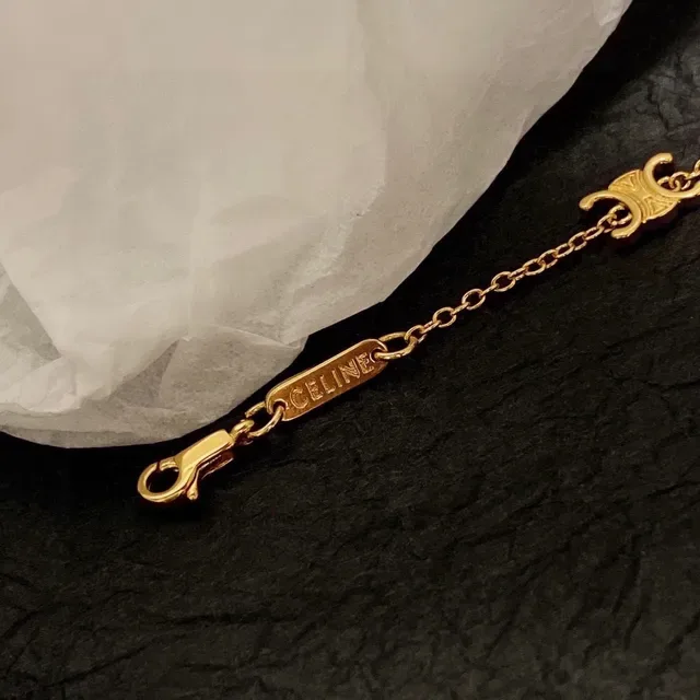 Collier chaîne avec charms de cœur et étoile en or 4