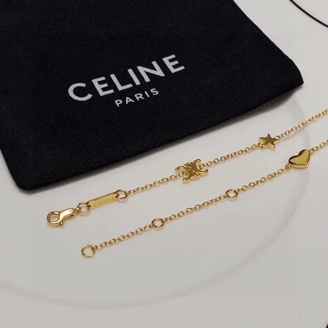 Collier chaîne avec charms de cœur et étoile en or 5