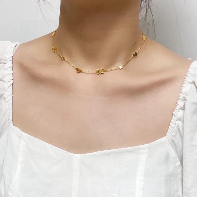 Collier chaîne avec charms de cœur et étoile en or 8