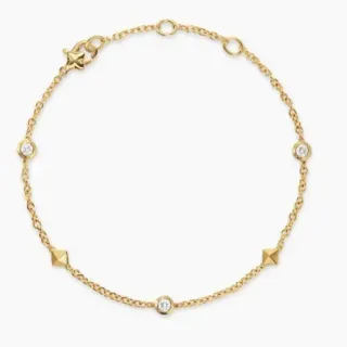 Pulsera de cadena dorada transparente con piedras redondas engarzadas