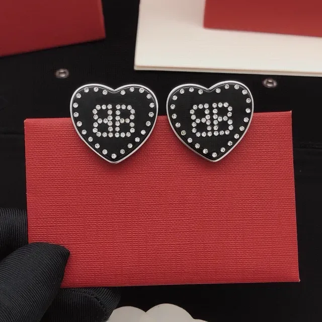 Heart-Shaped Crystal-Embellished Black Enamel Stud Earrings 8