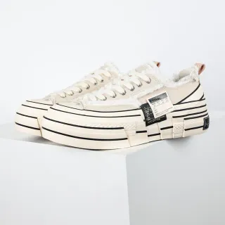 Off-White حذاء رياضي منصة كريمي وأسود مخطط