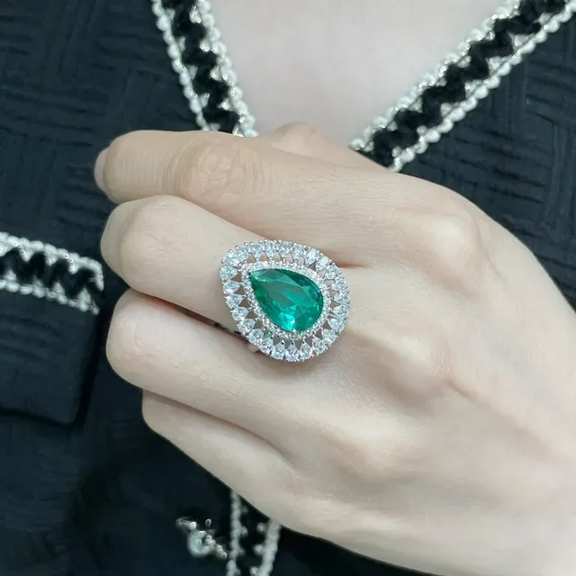 Pear-Cut Emerald and Diamond Halo Ring 9