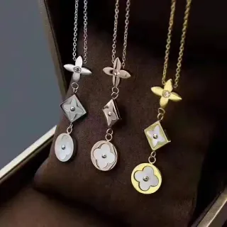 Colliers pendants argent et or floraux géométriques en nacre de perle