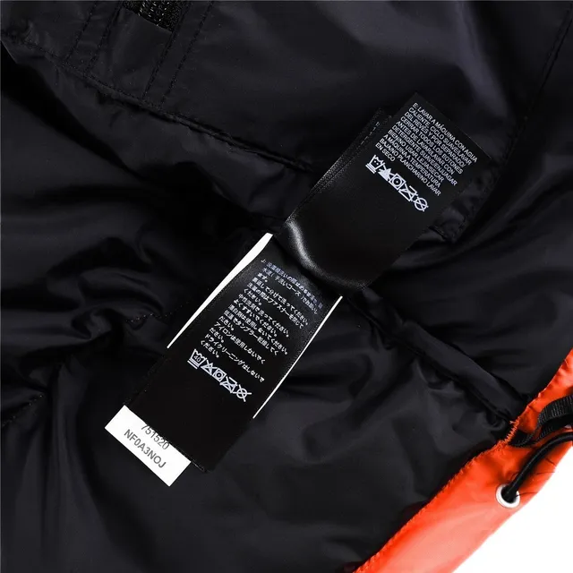 The East Fiona 1996 Classic blanc et noir silhouette boxy matelassage horizontal blouson en duvet 22