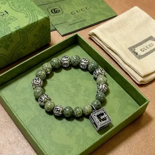 سوارة Gucci GG Marmont أخضر فضي خرز متشابك نمط G