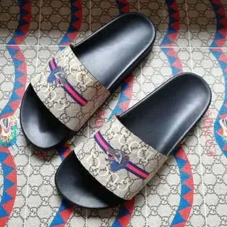 Gucci Screener beige negro rayas web dragón slides