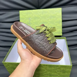 Gucci Screener 棕绿色 GG Monogram 压花皮革 丝带蕾丝蝴蝶结细节 拖鞋