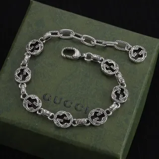 سوارة Gucci فضي أسود Interlocking G Motif إنهاء أكسدي