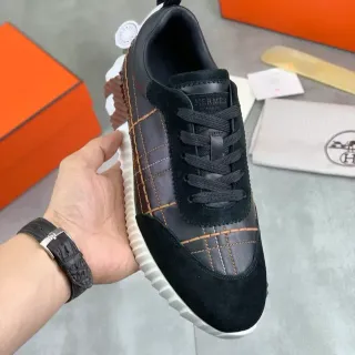 Hermès Black and Tan Stitched Panel Sneaker