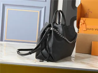 Louis Vuitton Sac seau à bandoulière en chaîne beige marron imprimé monogramme 9