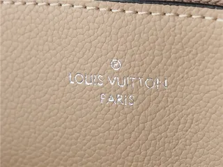 Louis Vuitton Sac seau à bandoulière en chaîne beige marron imprimé monogramme 12