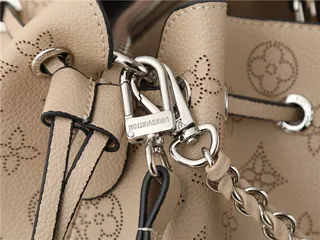 Louis Vuitton Sac seau à bandoulière en chaîne beige marron imprimé monogramme 14