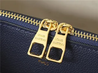 Louis Vuitton Sac seau à bandoulière en chaîne beige marron imprimé monogramme 22