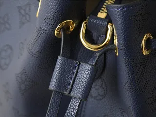 Louis Vuitton Sac seau à bandoulière en chaîne beige marron imprimé monogramme 24
