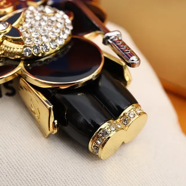 Louis Vuitton কালো সোনা এনামেল ফ্লোরাল চার্ম মেটাল ক্রসবডি ব্যাগ 7