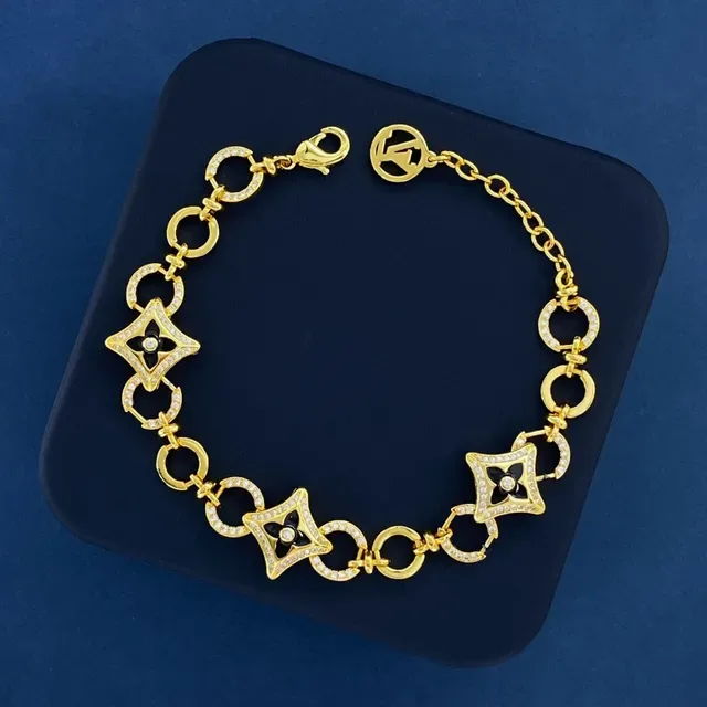 Louis Vuitton Blossom Quatrefoil Link Gold and Black Enamel Crystal Bracelet 2