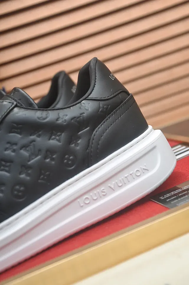 Louis Vuitton LV Trainer Black White Monogram-Embossed Leather Low-Top Lifestyle Sneakers 2