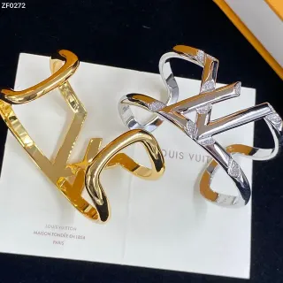 Louis Vuitton Openwork Cuff ذهبي فضي سوار نقشي