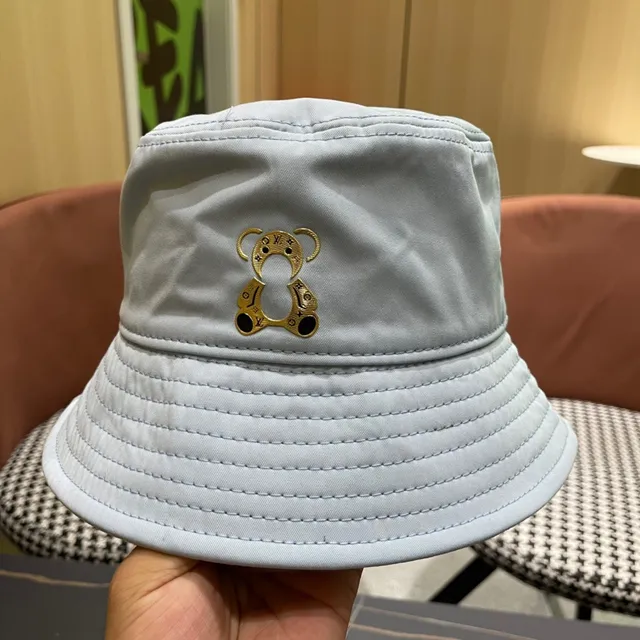 Louis Vuitton sombrero de cubo monograma quiltado azul claro 9