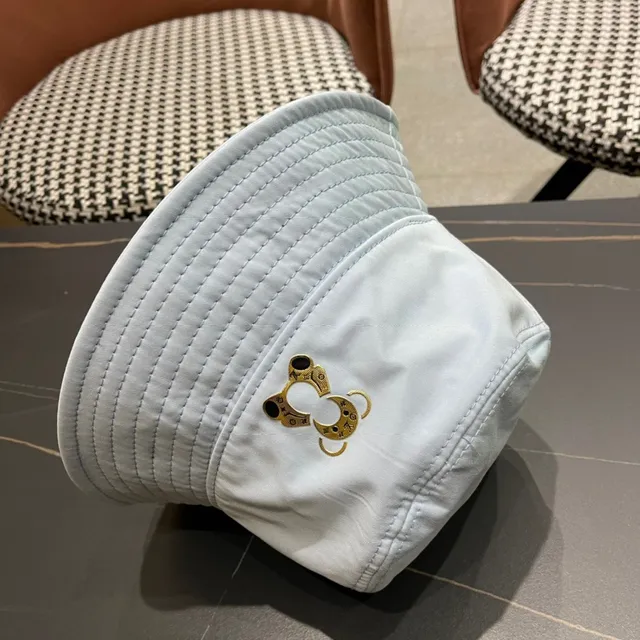 Louis Vuitton sombrero de cubo monograma quiltado azul claro 11