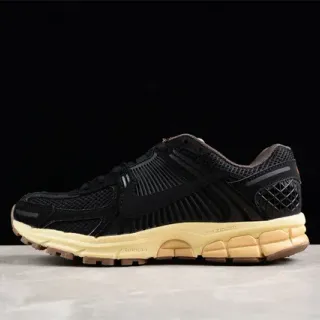 Nike pretos e bege de malha e sintético com overlay de jaula com costuras tênis de corrida