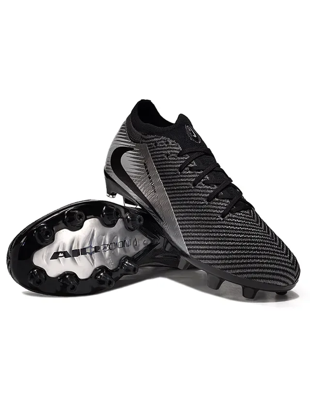Nike Zapatillas de fútbol negro y plata con superior de knit y panel metálico para terreno firme 5