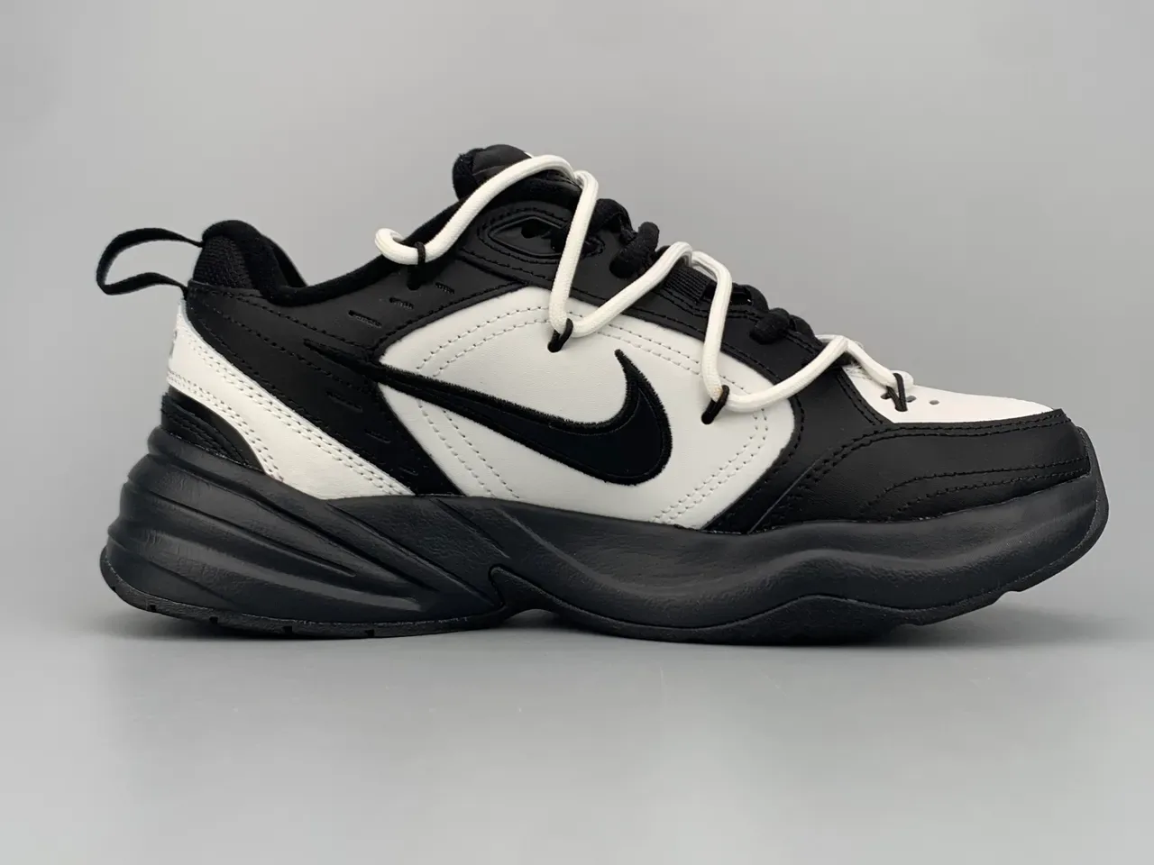 Nike Chaussures Lifestyle Noir Blanc Semelle Médiane Chunky Sculptée En Cuir Synthétique Et Cuir Supérieur En Couches 10