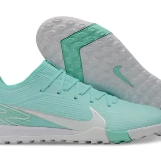 Nike Chaussures de football indoor low-cut avec upper en maille vert et blanc