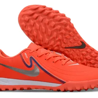 Nike Sapatos de futebol turf de corte baixo com parte superior sintética laranja branco com gráfico Swoosh em camadas