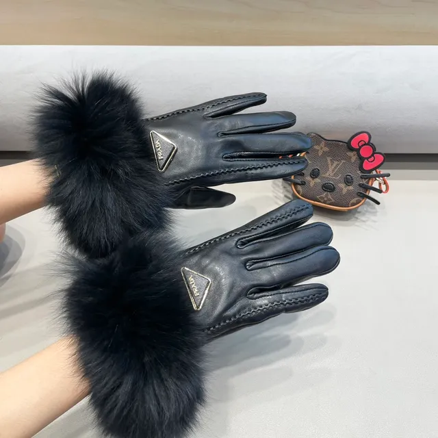 Prada Gants en cuir avec poignet en fourrure noire 9