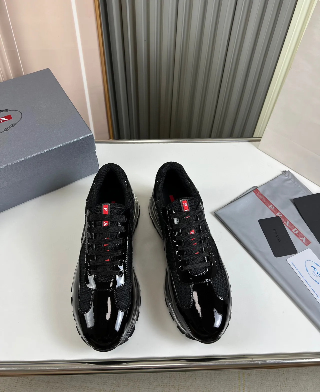 Prada Cloudbust Sneakers Lifestyle Noir en Cuir Patenté et Maille 8