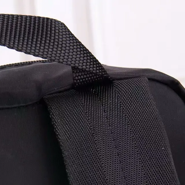 Prada Re-Edition Black Matte Nylon Construction Structured Rectangular Silhouette Casual Backpack 3