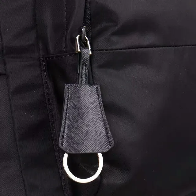 Prada Re-Edition Black Matte Nylon Construction Structured Rectangular Silhouette Casual Backpack 4