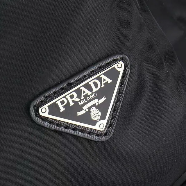 Prada Re-Edition Black Matte Nylon Construction Structured Rectangular Silhouette Casual Backpack 6