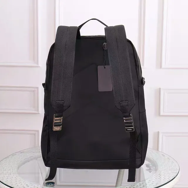 Prada Re-Edition Black Matte Nylon Construction Structured Rectangular Silhouette Casual Backpack 7