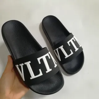 Valentino VLTN Slide 黑色和白色拖鞋