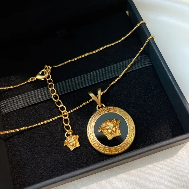Versace Gold Black Circular Medallion Metal Necklace 4